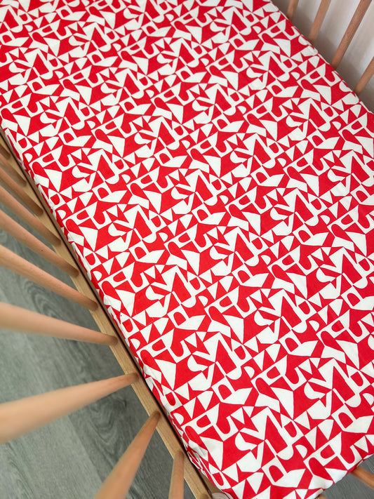 Changing mat cover- Orange and white geometric